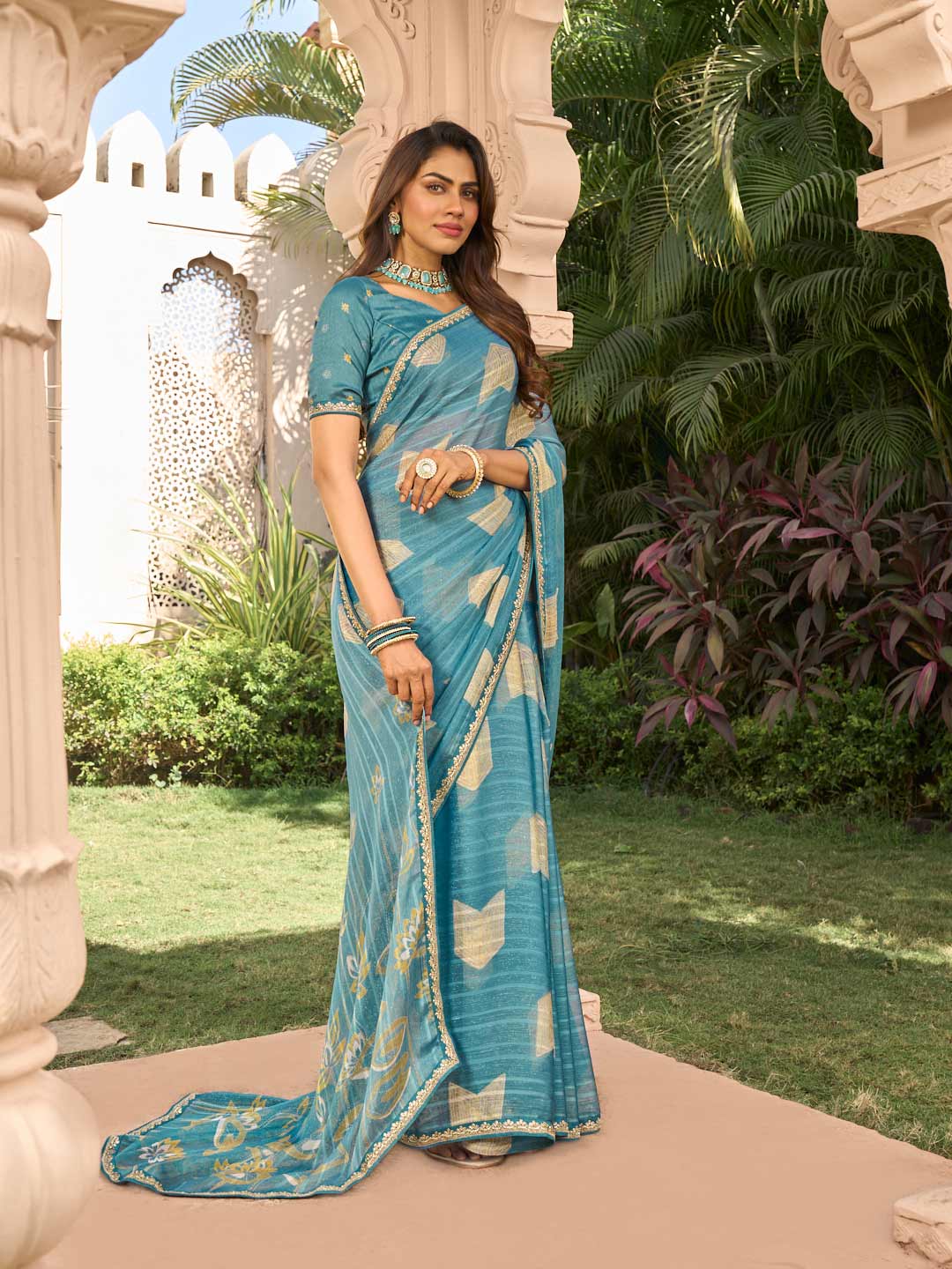 Blue chiffon saree with silk blouse