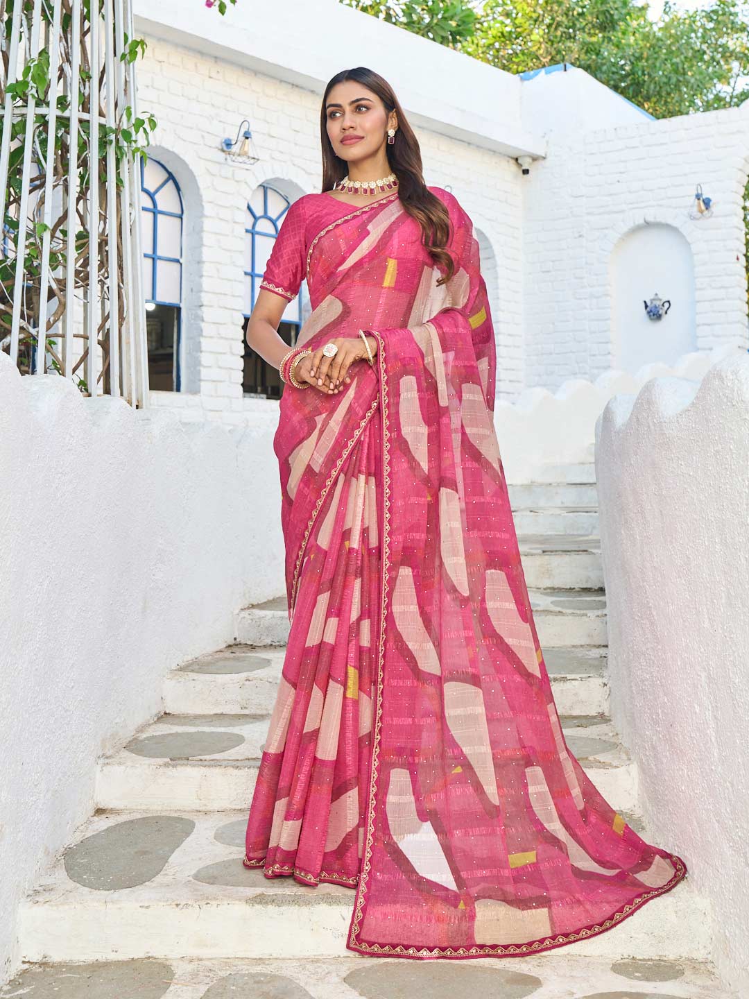 Pink chiffon abstract printed saree