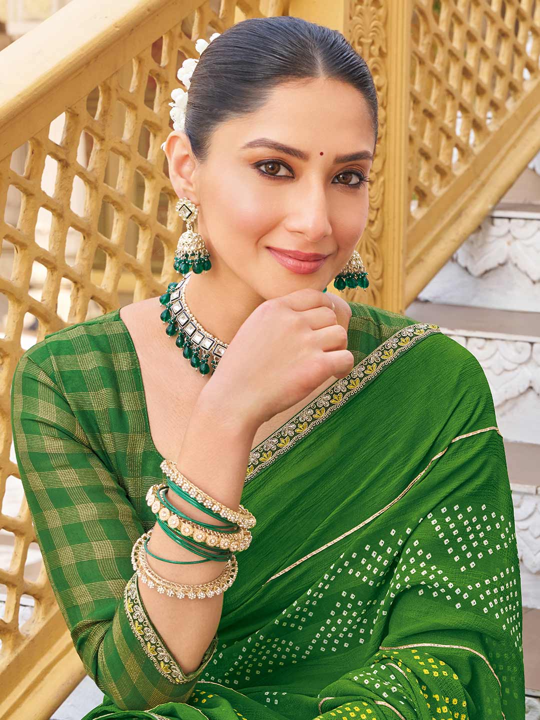Green saree with checked blouse