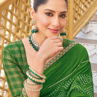 Green saree with checked blouse