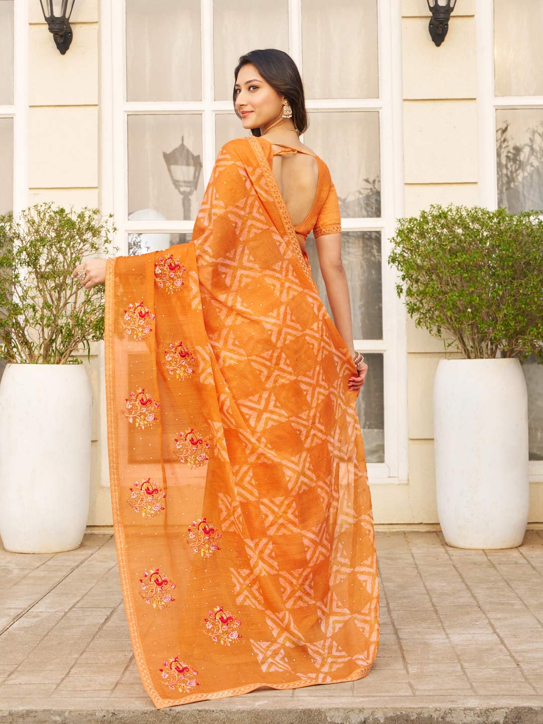 Orange embroidered chiffon saree