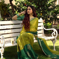 Green embroidered silk blend saree party wear 