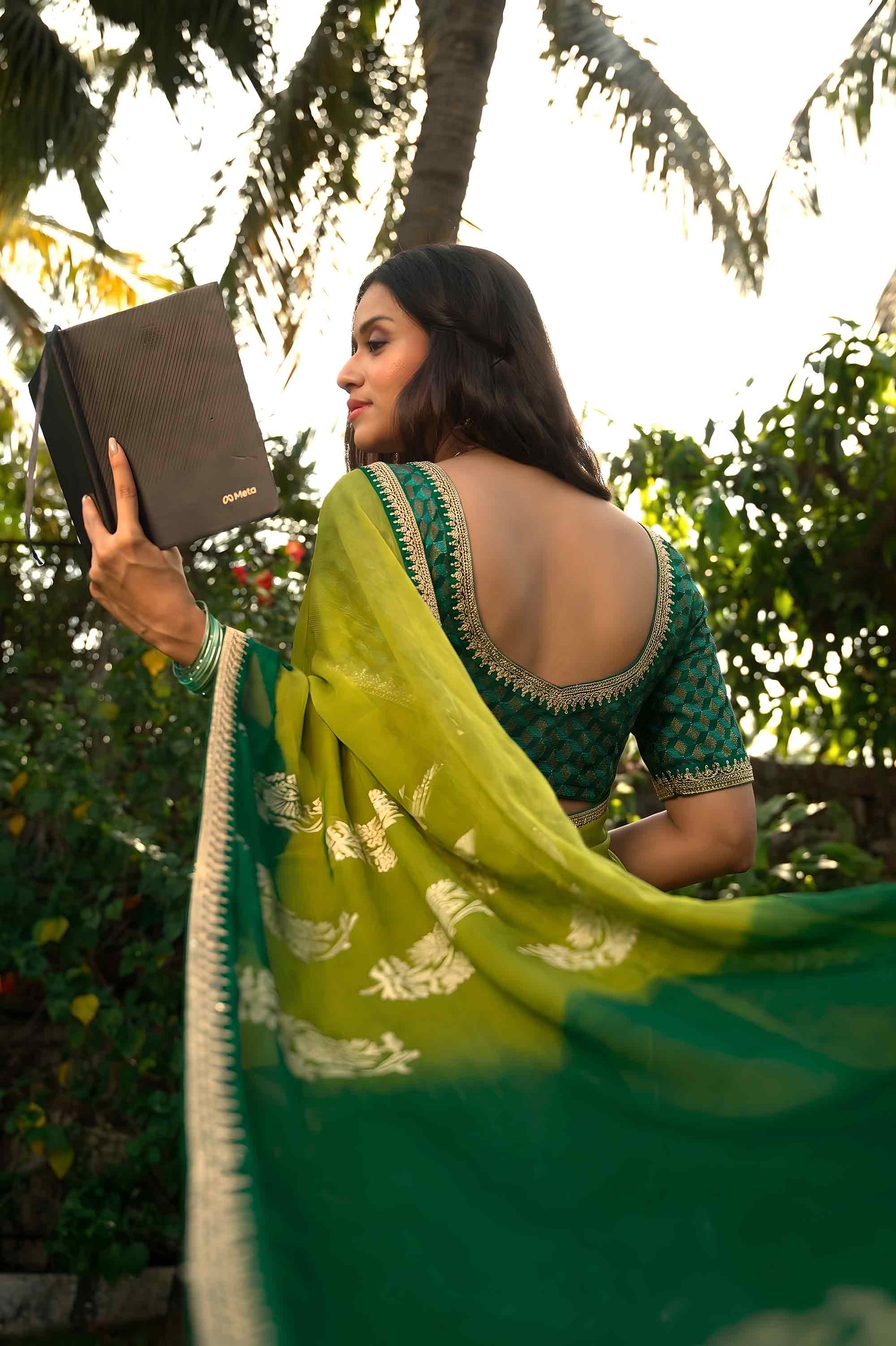 Green embroidered silk blend saree daily wear 