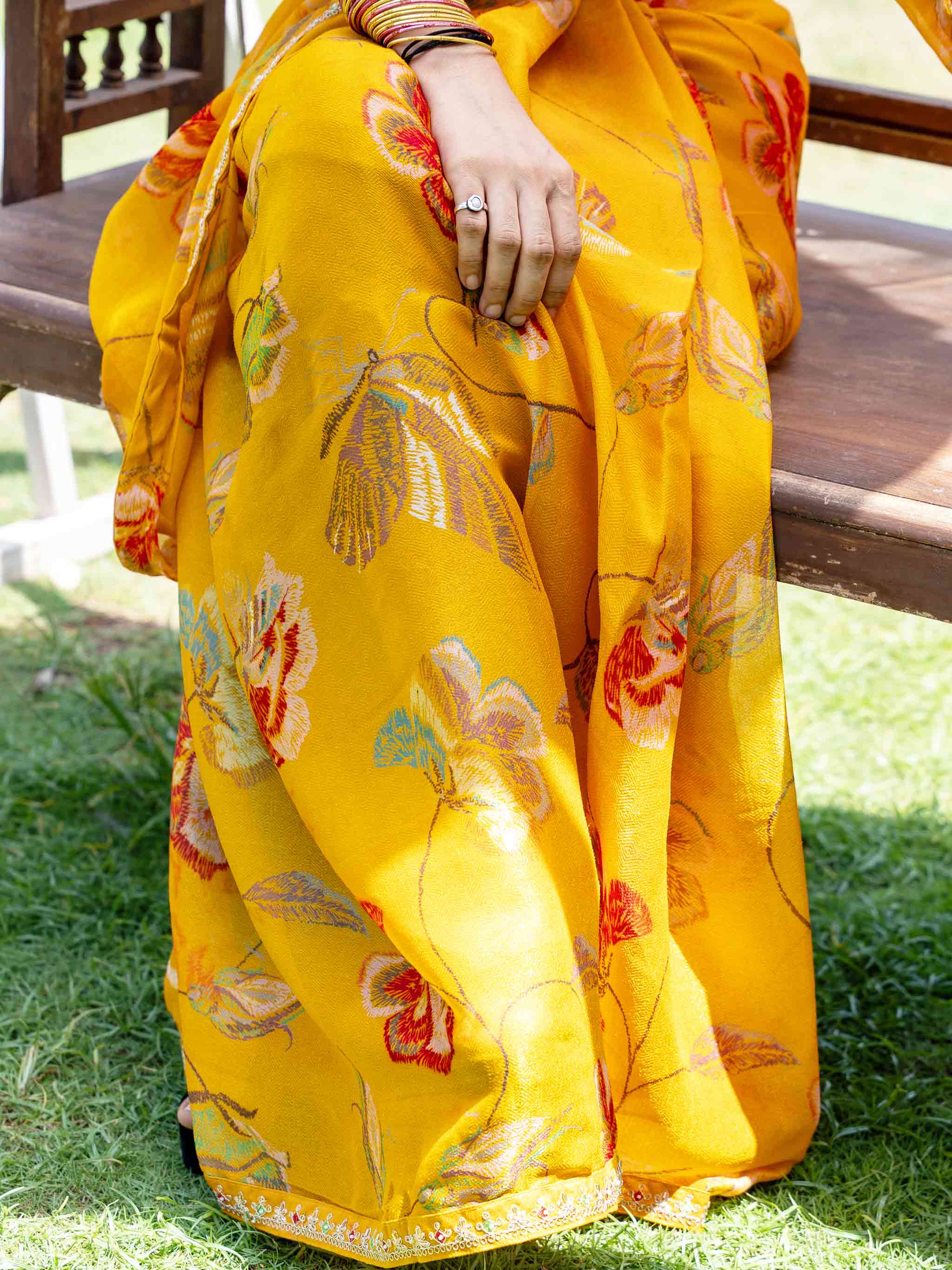 Mustard embroidered chiffon saree wedding wear