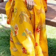 Mustard embroidered chiffon saree wedding wear