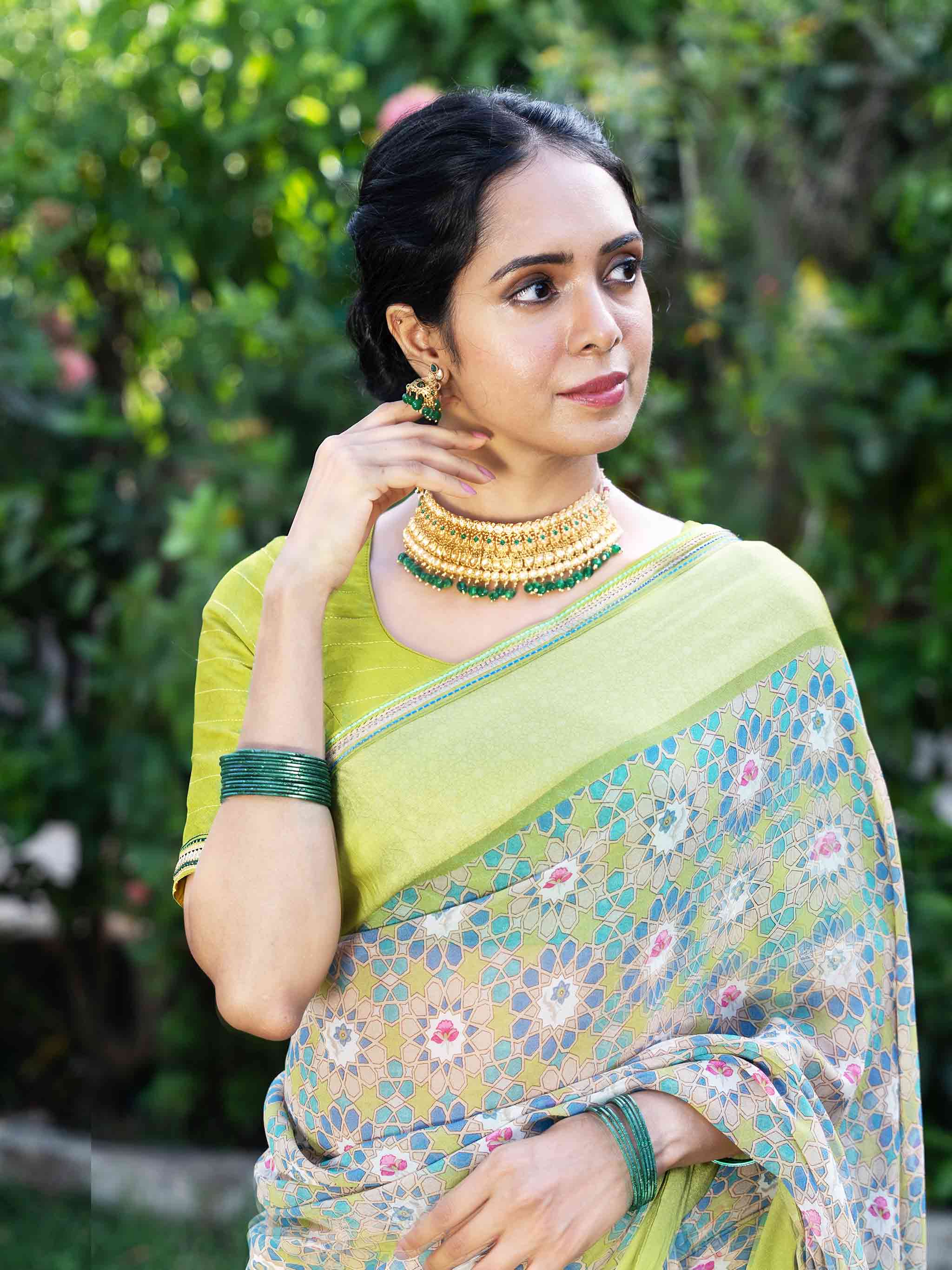 Green floral printed georgette saree festive wear
