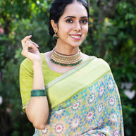  Green floral printed georgette saree casual wear