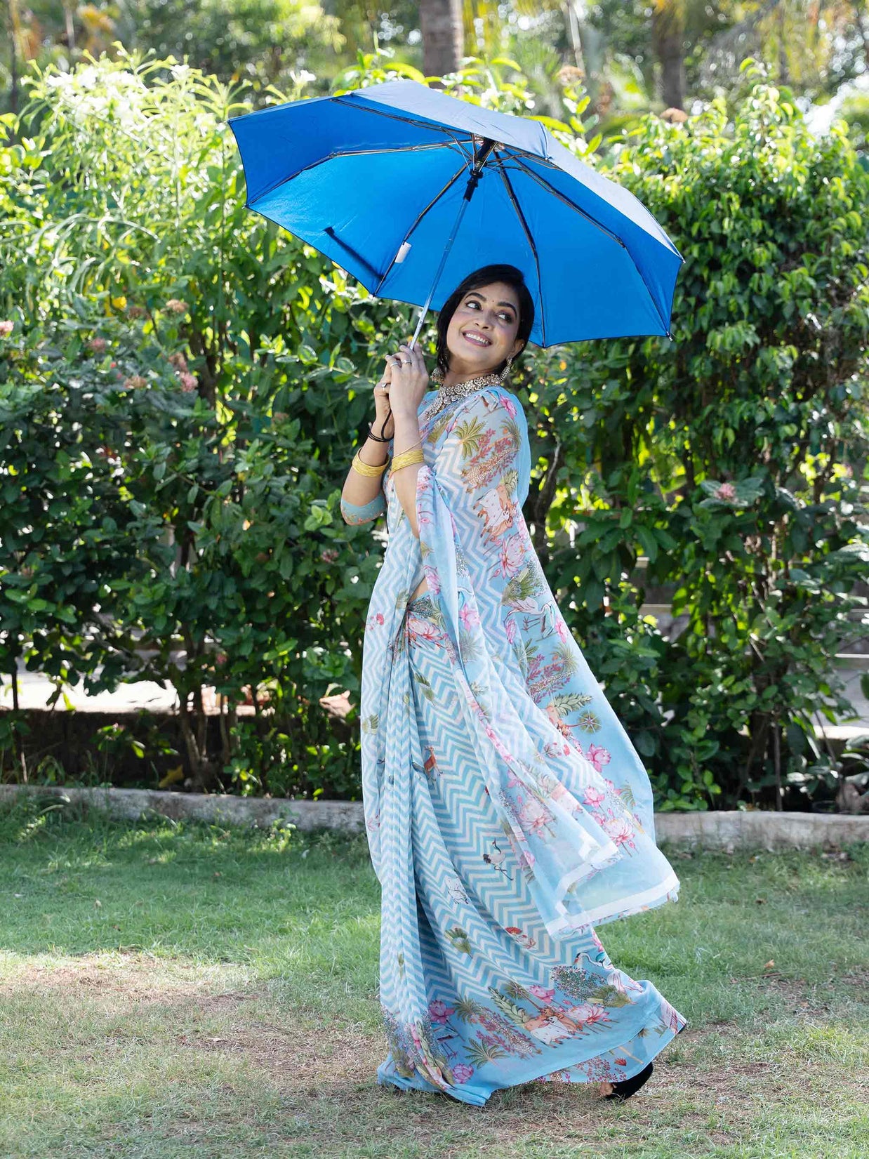 Blue printed georgette saree casual wear