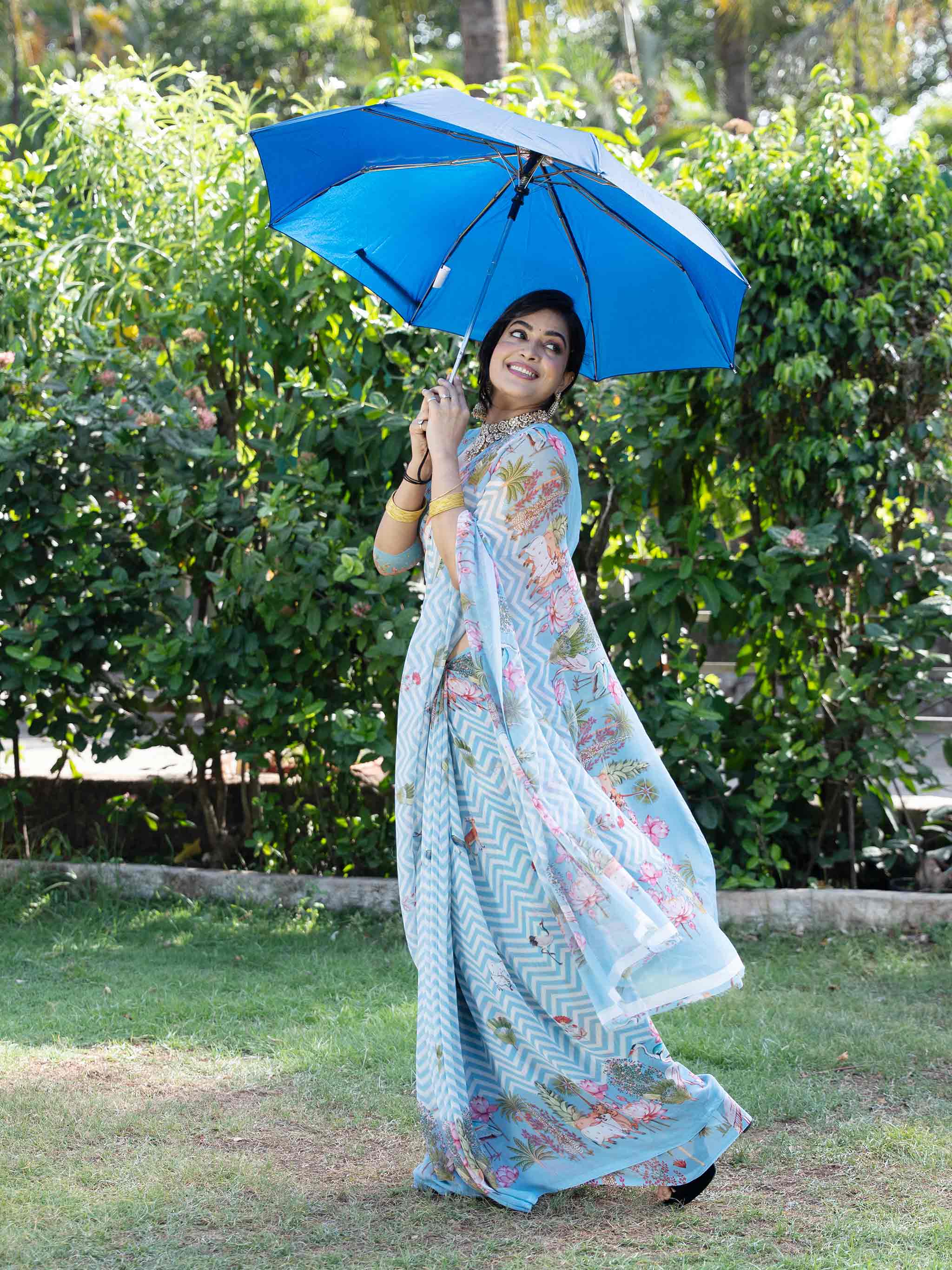 Blue printed georgette saree casual wear