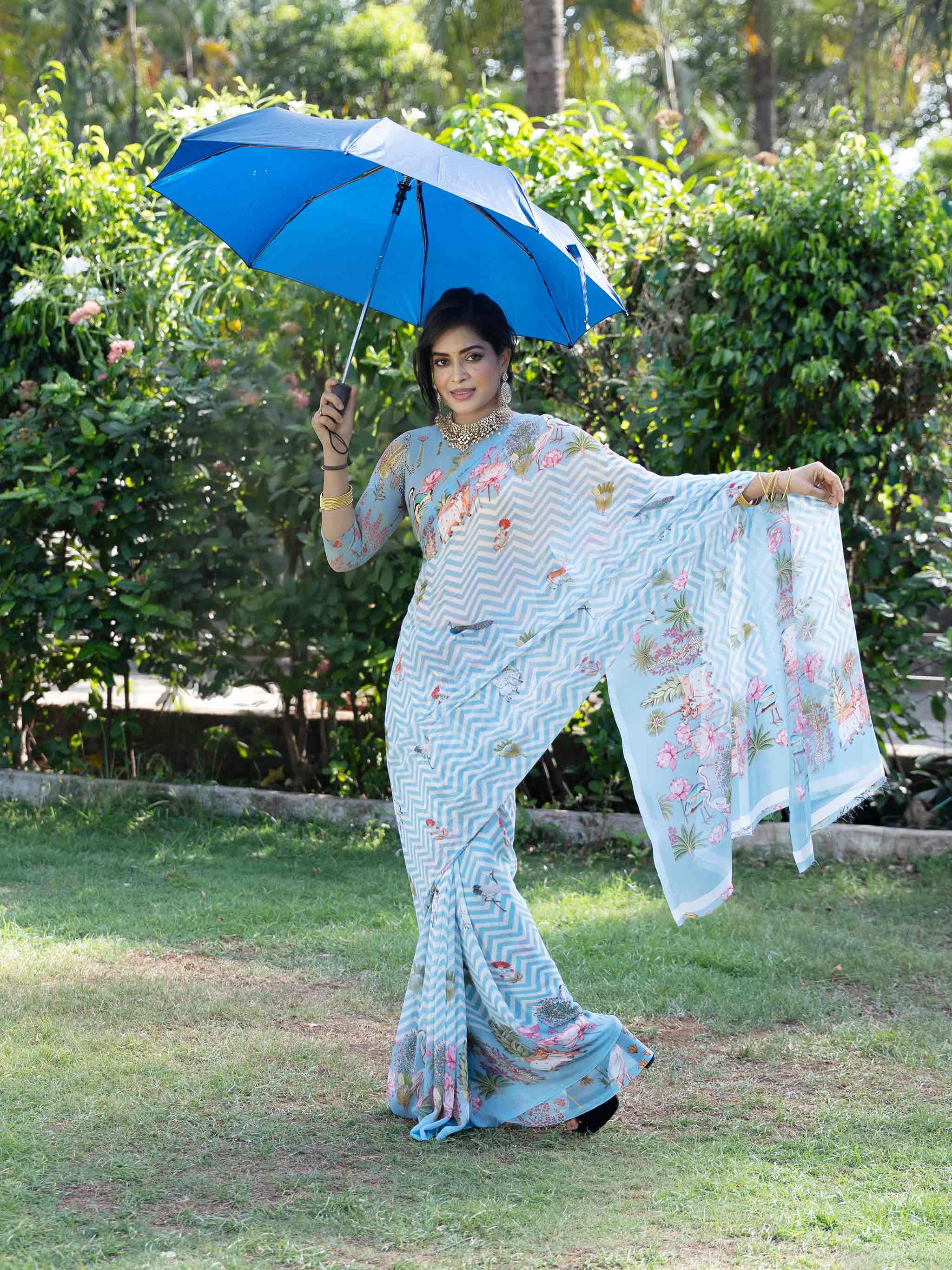 Blue printed georgette saree daily wear