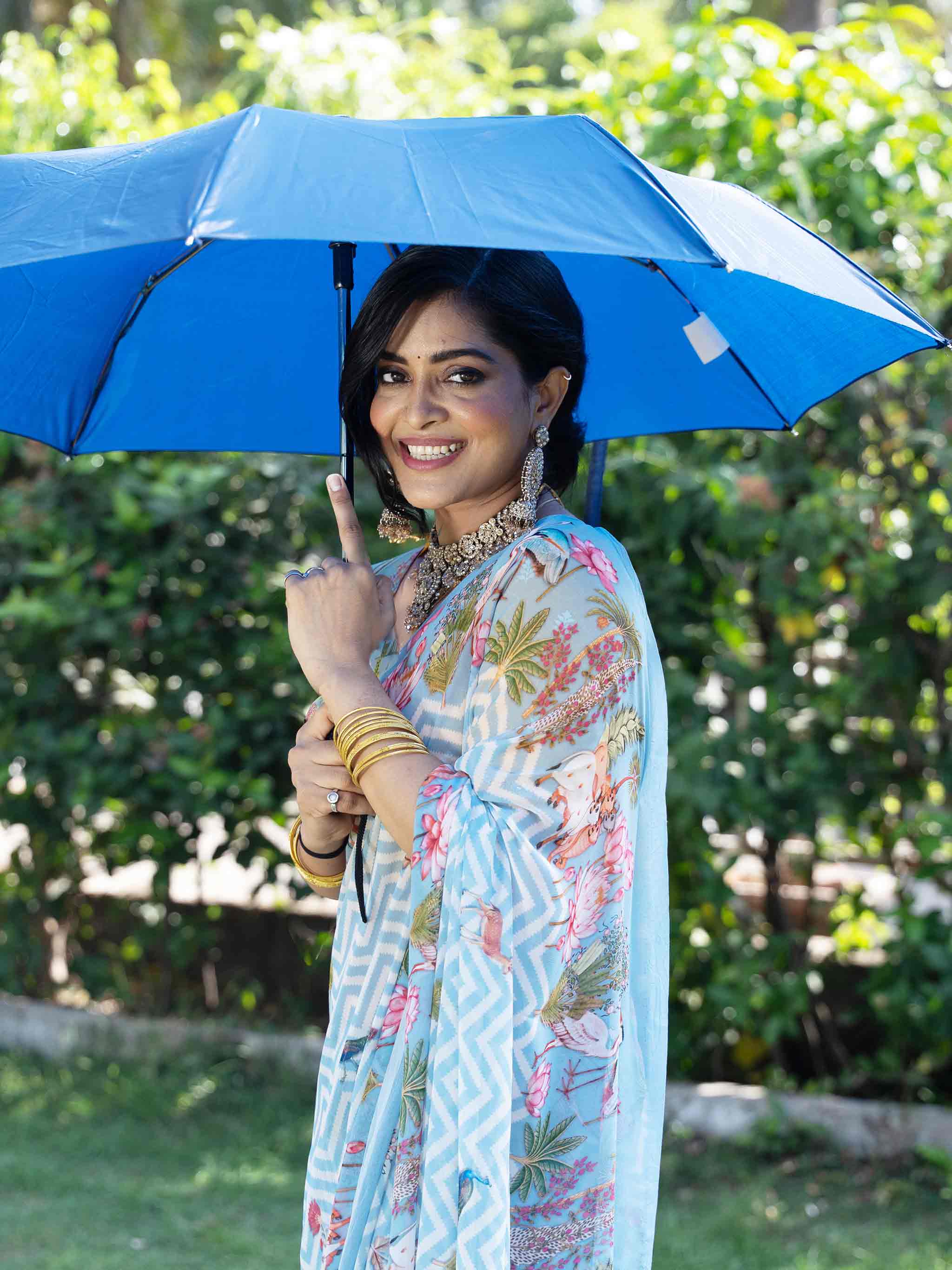 Blue printed georgette saree festive wear