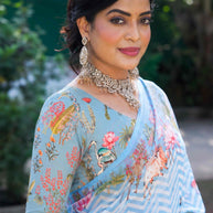 Blue printed georgette saree wedding wear