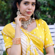 Yellow floral embroidered silk blend saree festive wear 