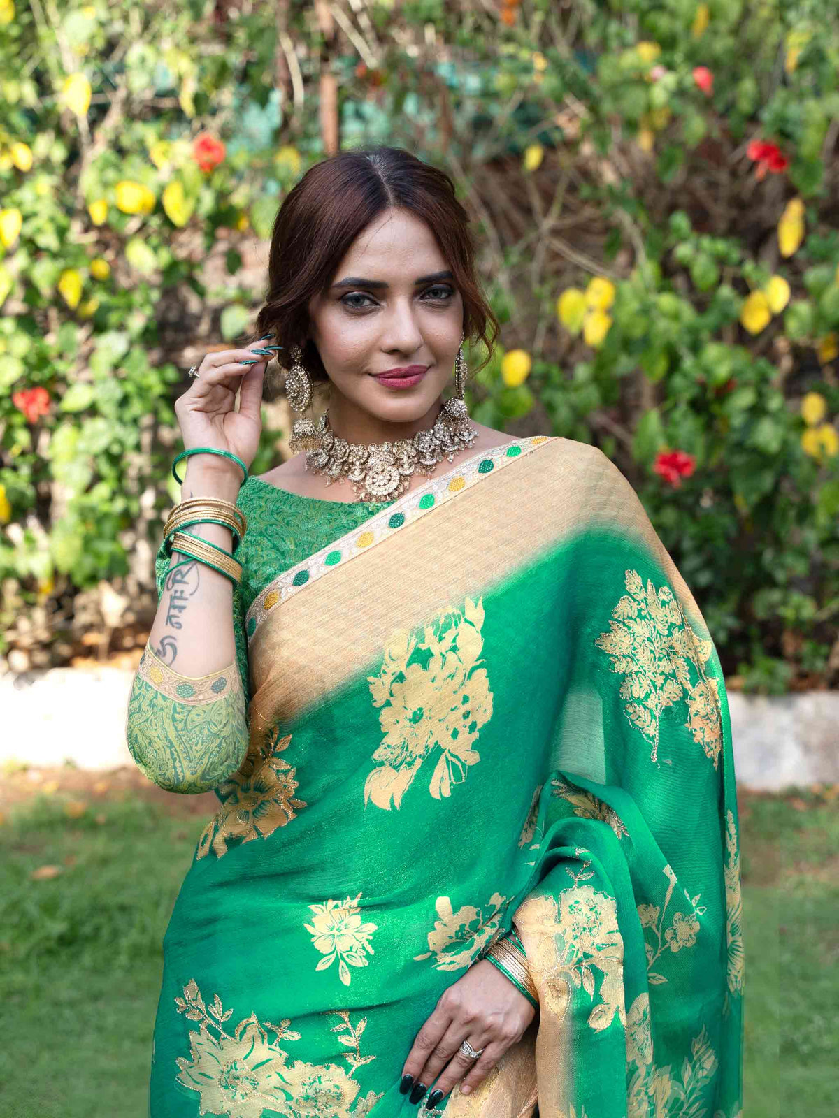 Green embroidered silk blend saree festive wear 