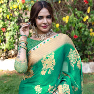 Green embroidered silk blend saree festive wear 
