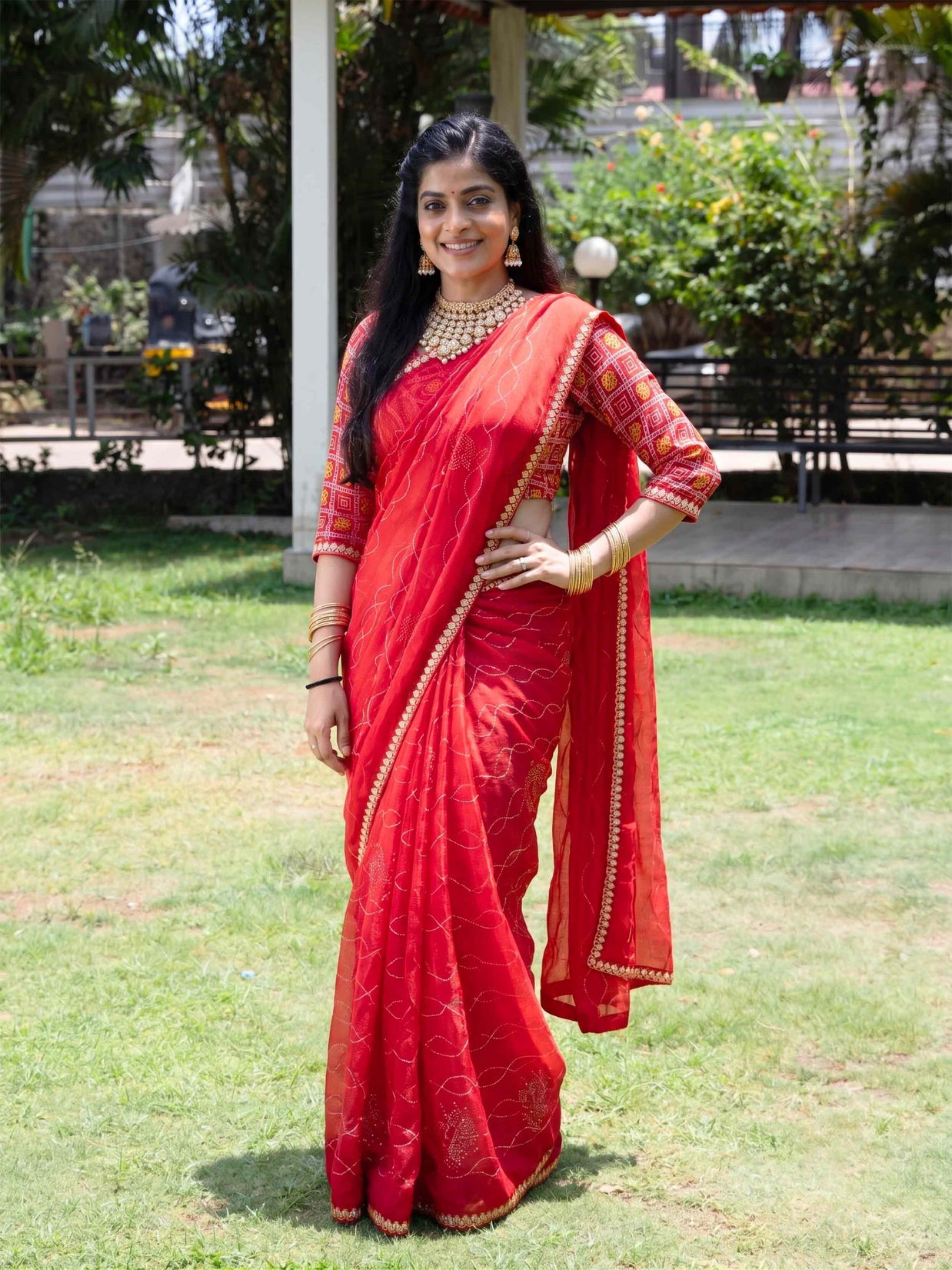 Red zari embroidered chiffon saree party wear 