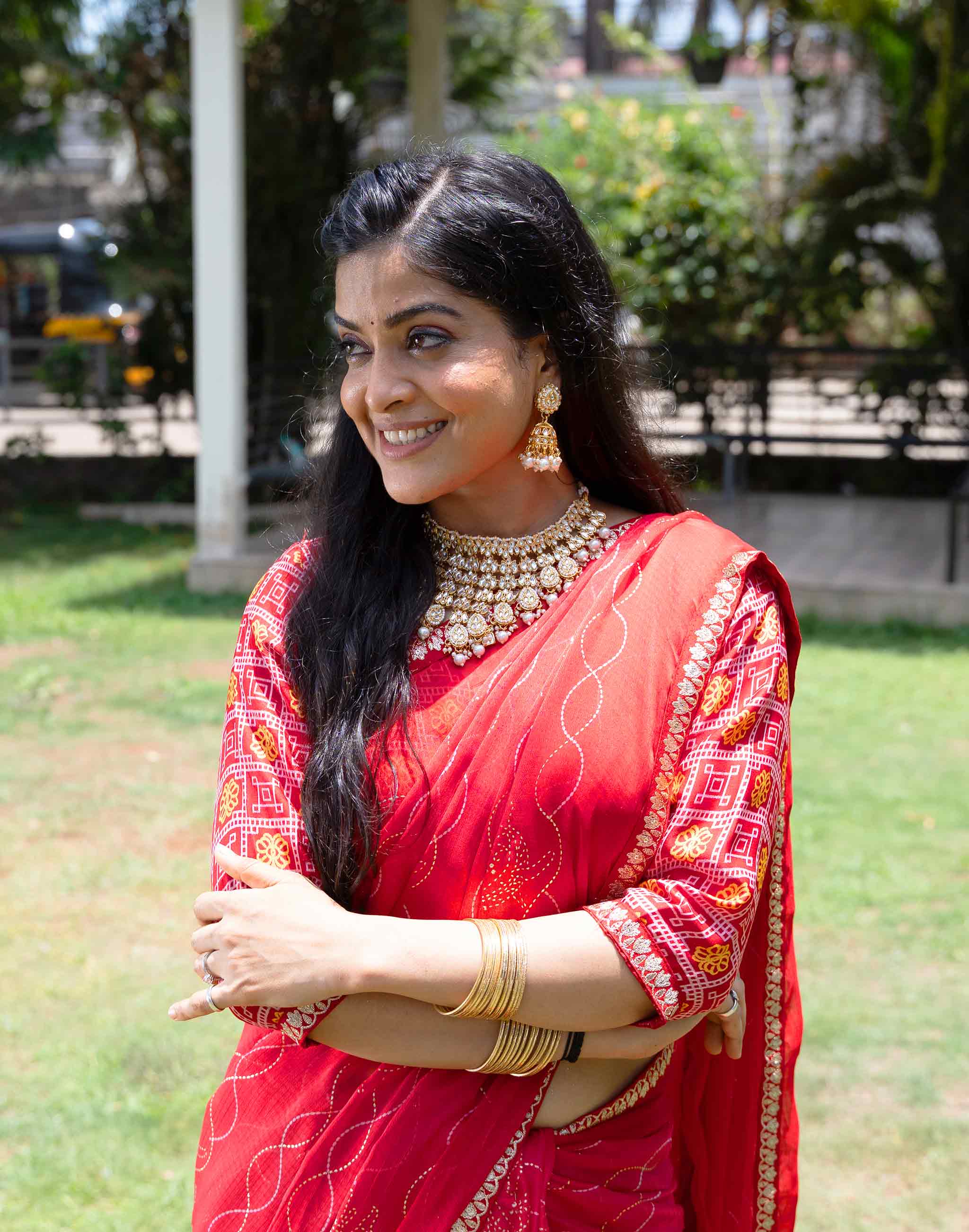 Red bandhani printed chiffon saree festive wear 