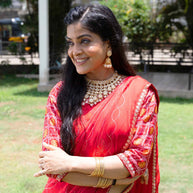 Red bandhani printed chiffon saree festive wear 