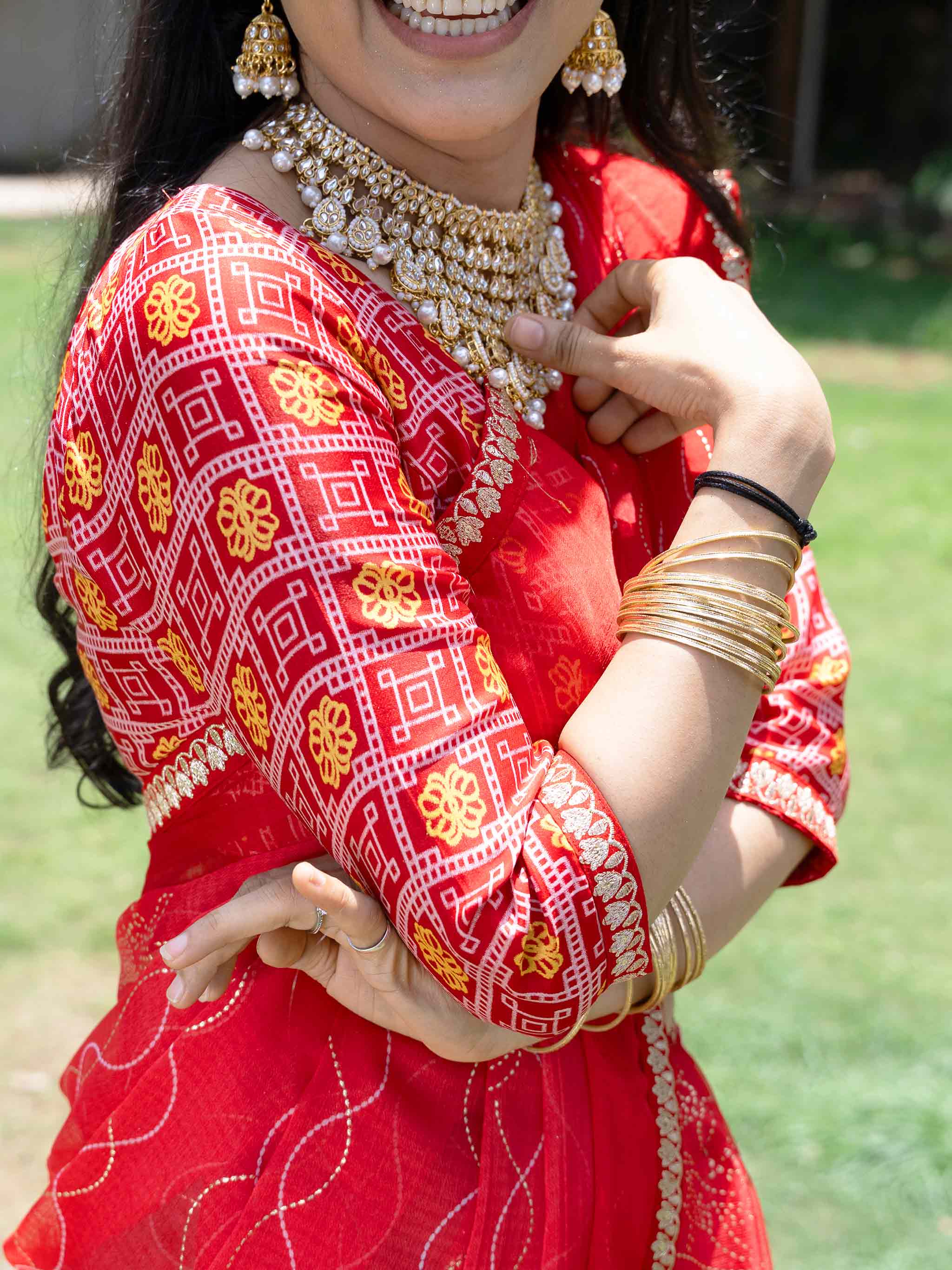 Red patola printed chiffon saree festive wear