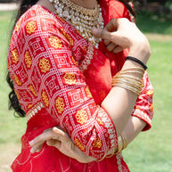 Red patola printed chiffon saree festive wear