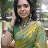 Green self-striped Silk Blend saree casual wear