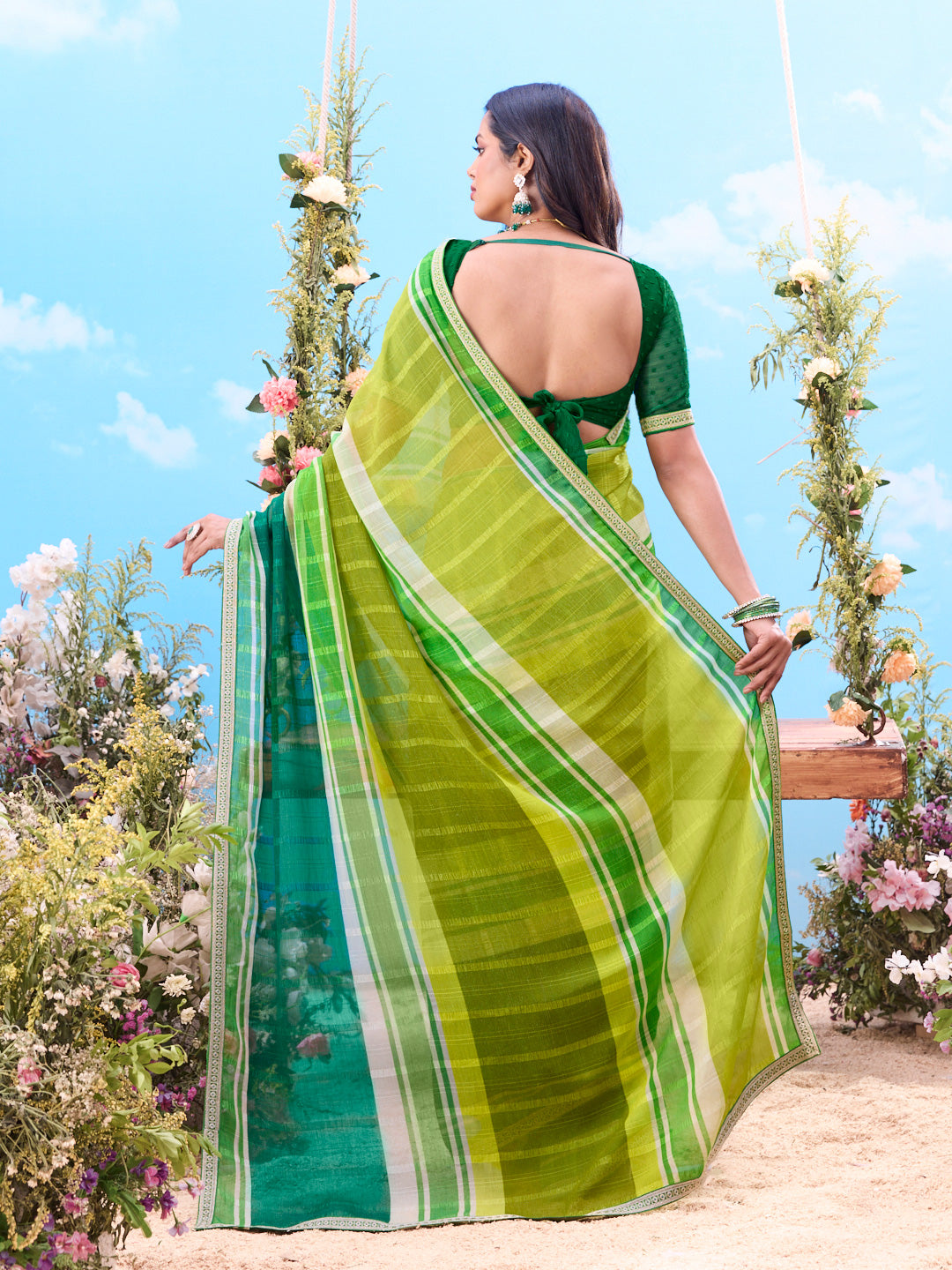 Green striped patterned georgette saree casual wear