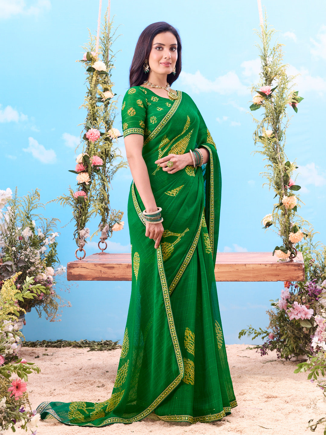 Green all-over printed silk saree festive wear