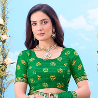 Green embroidered silk saree wedding wear