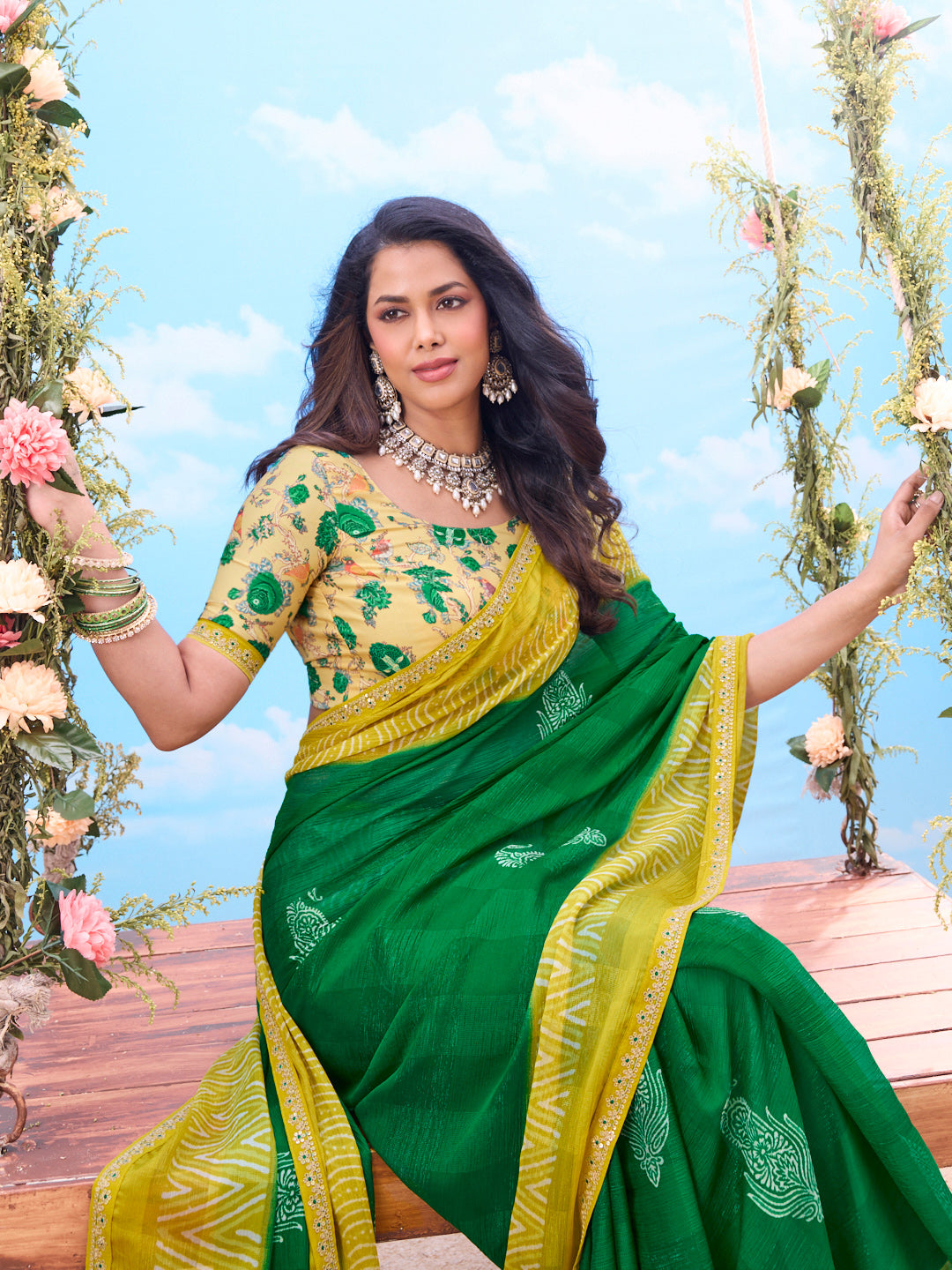 Green printed chiffon saree festive wear