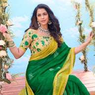 Green printed chiffon saree festive wear