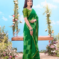 Green abstract leaf printed chiffon saree festive wear 