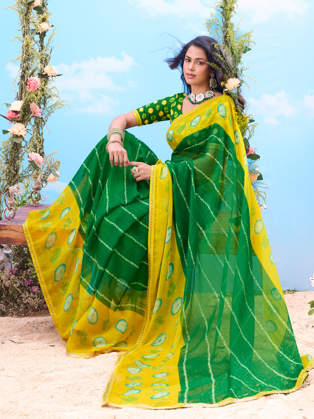 Green bandhani print chiffon saree festive wear 