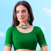 Light green polka dot chiffon saree casual wear