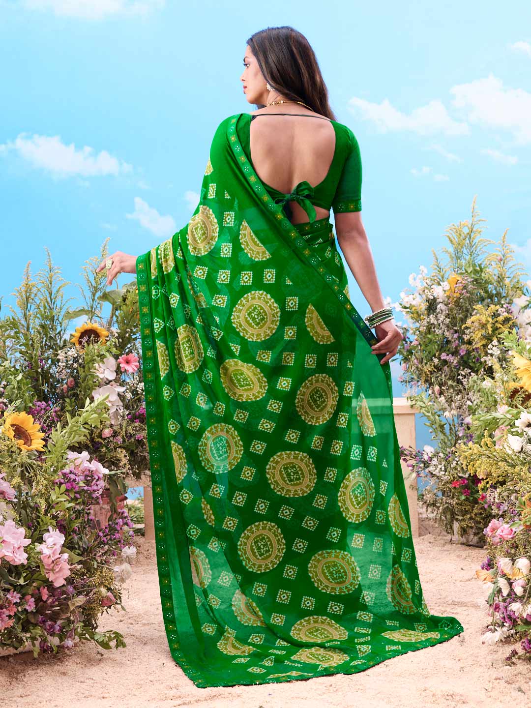 Green paisley printed georgette saree festive wear