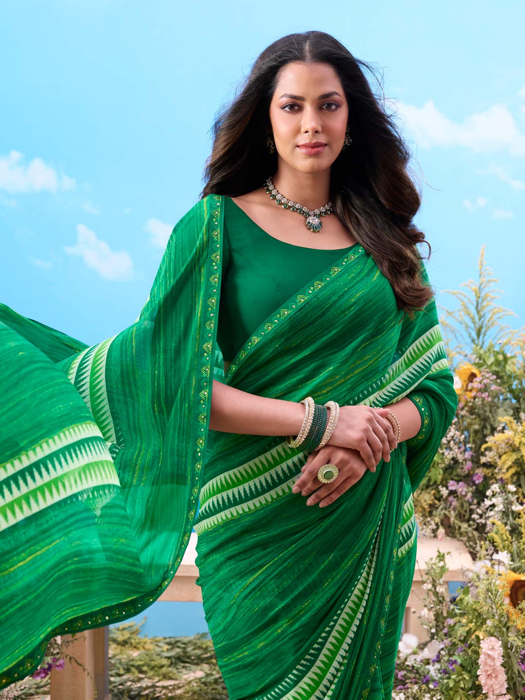 Green printed chiffon saree festive wear