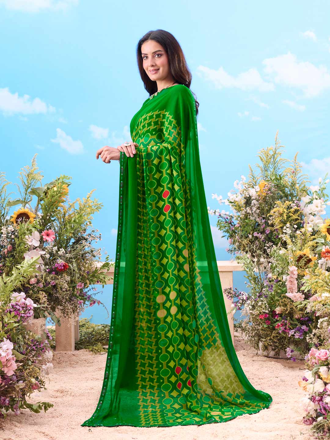 Green geometric printed georgette saree festive wear