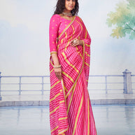 Pink striped embellished chiffon saree occasion wear 