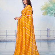 Orange white and gold striped pattern chiffon saree festive wear 