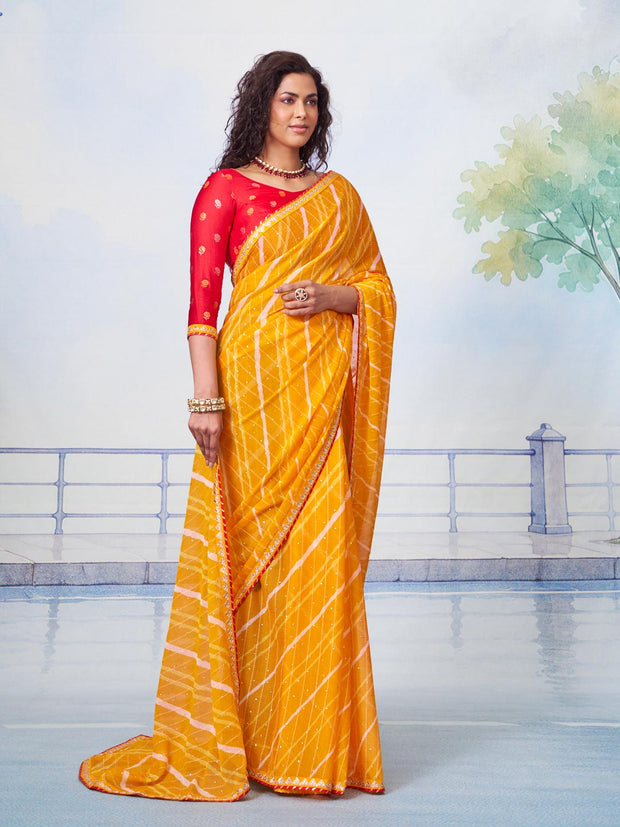 Orange leheriya with thin white stripes chiffon saree festive wear
