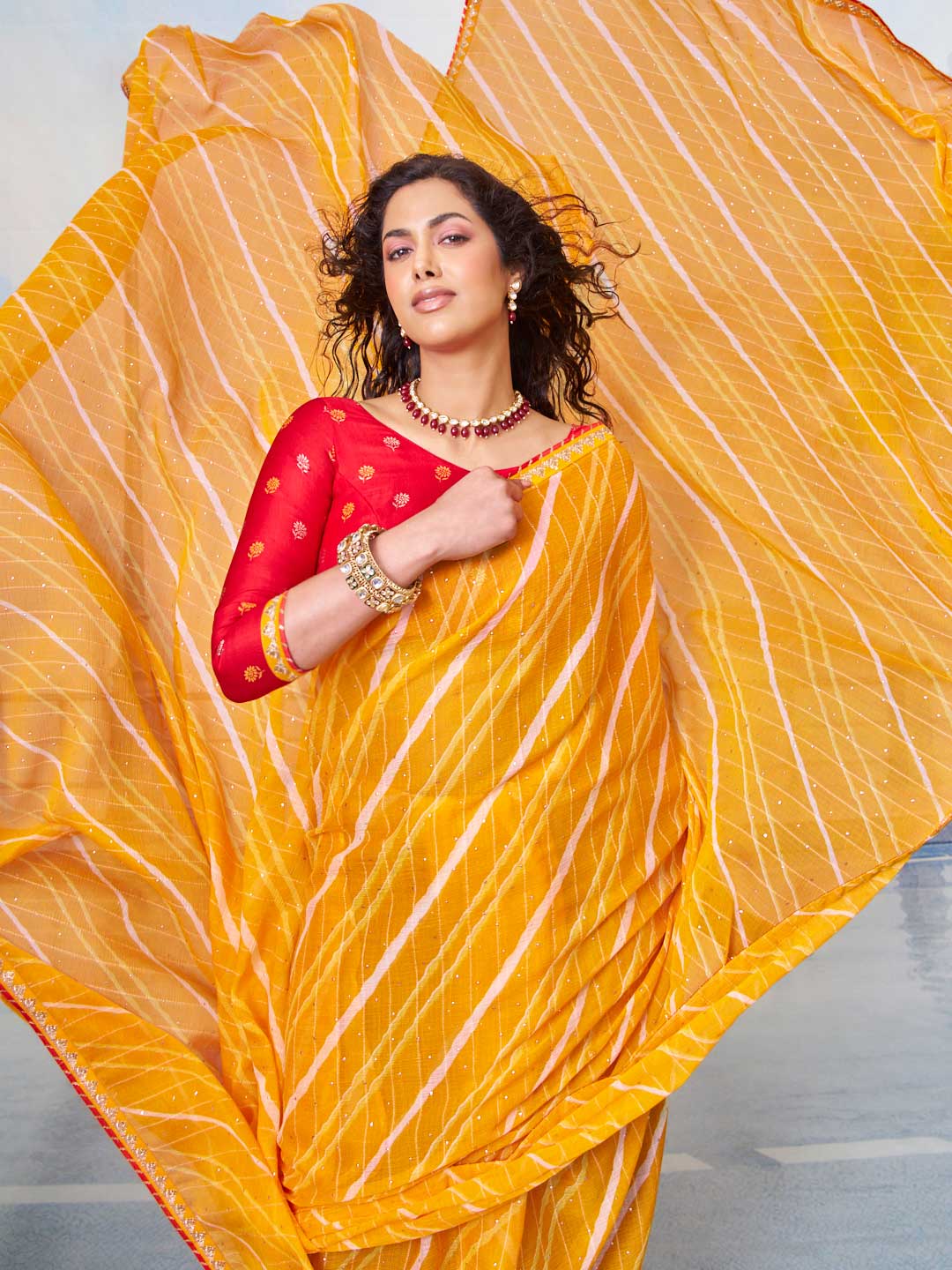 Orange stripe pattern with sequin work chiffon saree party wear 