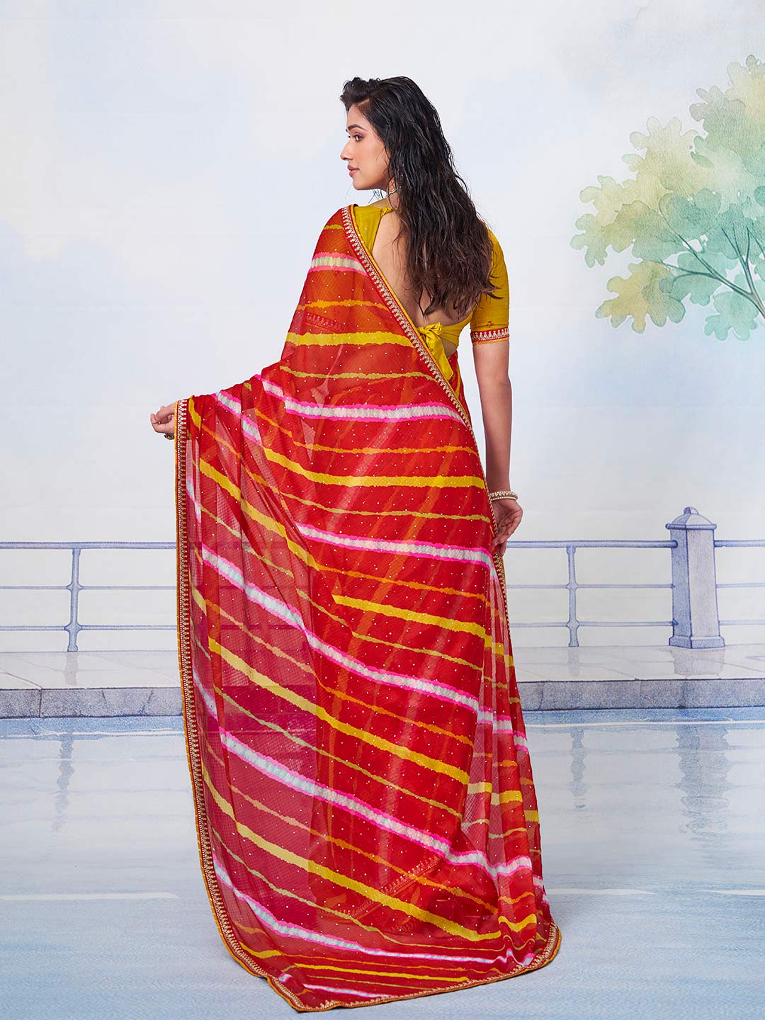 Red scattered motif body with red border featuring gold and silver patterned details chiffon saree ethnic wear