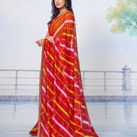 Red striped (yellow and pink) with small white dotted print and golden zigzag border chiffon saree party wear