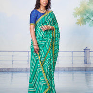 Blue white chevron stripes with scattered sequins and narrow yellow detailed border chiffon saree party wear