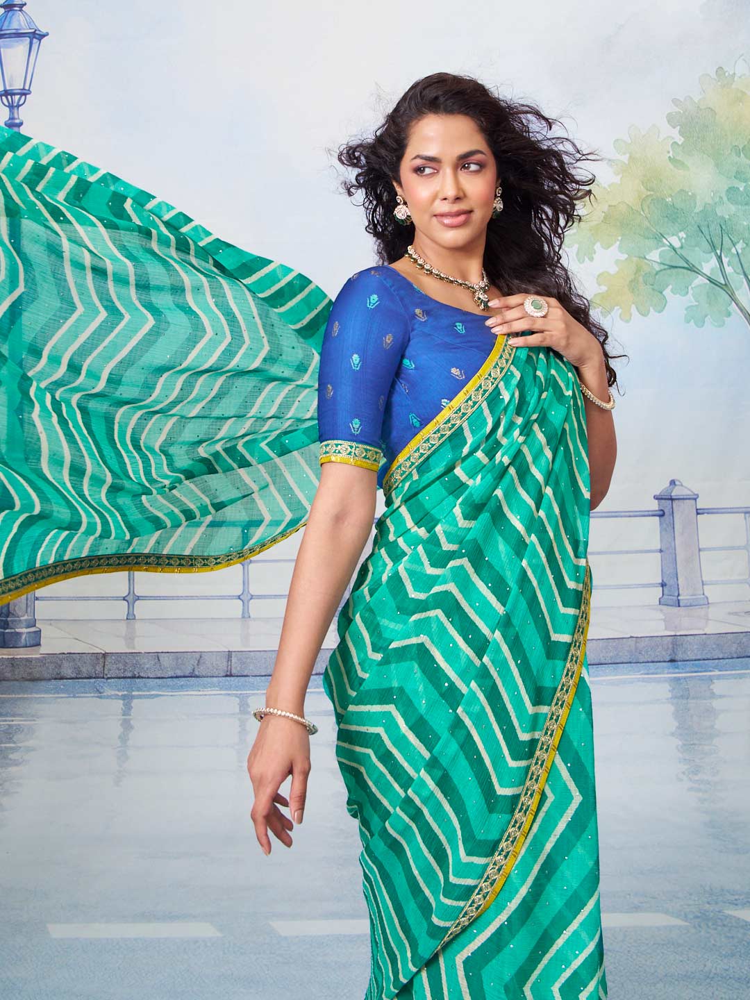 Blue green patterned body with yellow patterned border chiffon saree ethnic wear 
