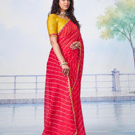 Red leheriya pattern with golden piping and white striped sequin work chiffon saree party wear
