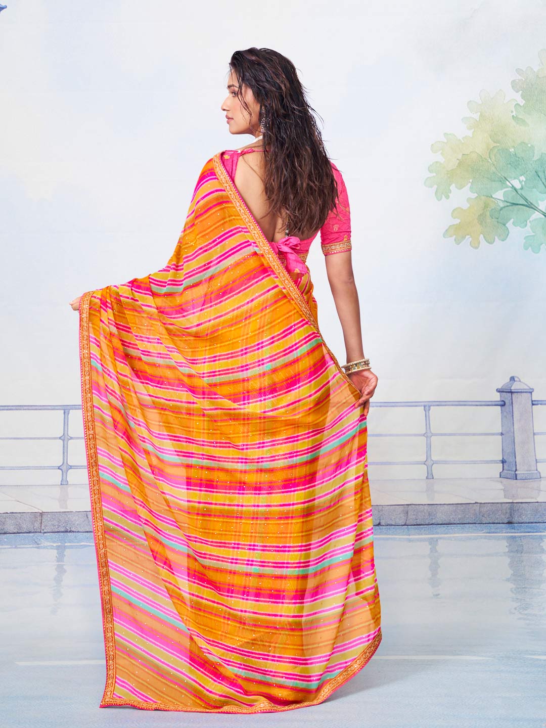Orange patterned chiffon saree daily wear