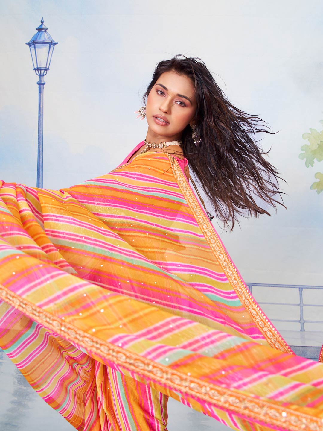 Orange embellished chiffon saree festive wear