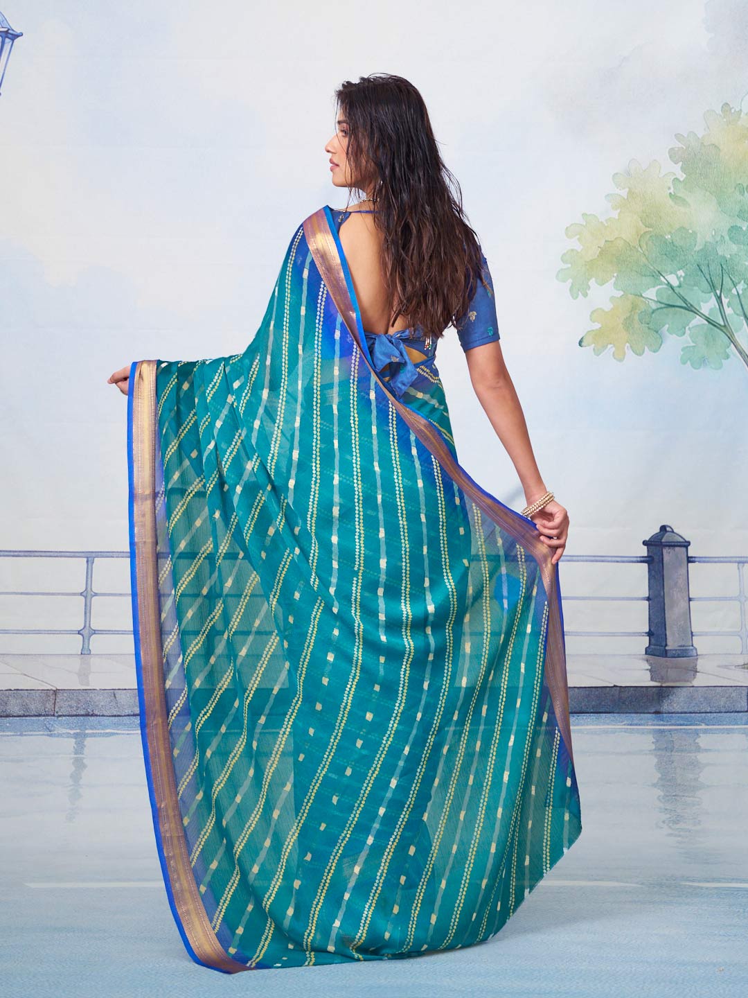 Blue bandhani printed chiffon saree festive wear