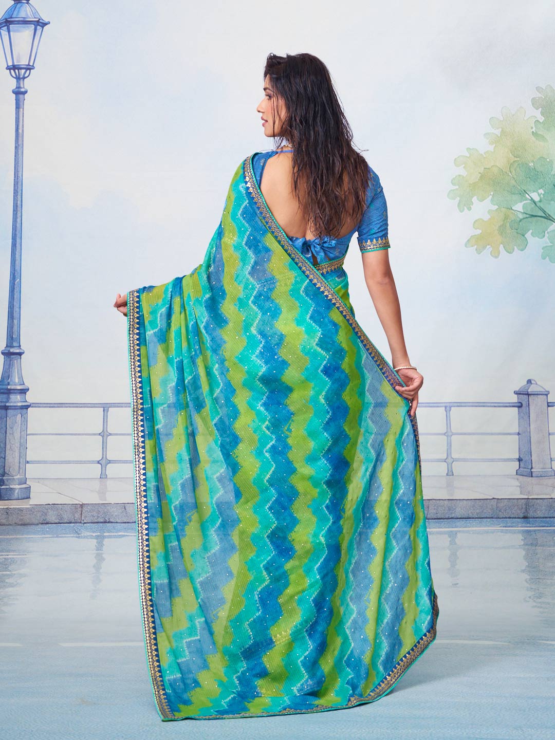 Blue embellished chiffon saree party wear