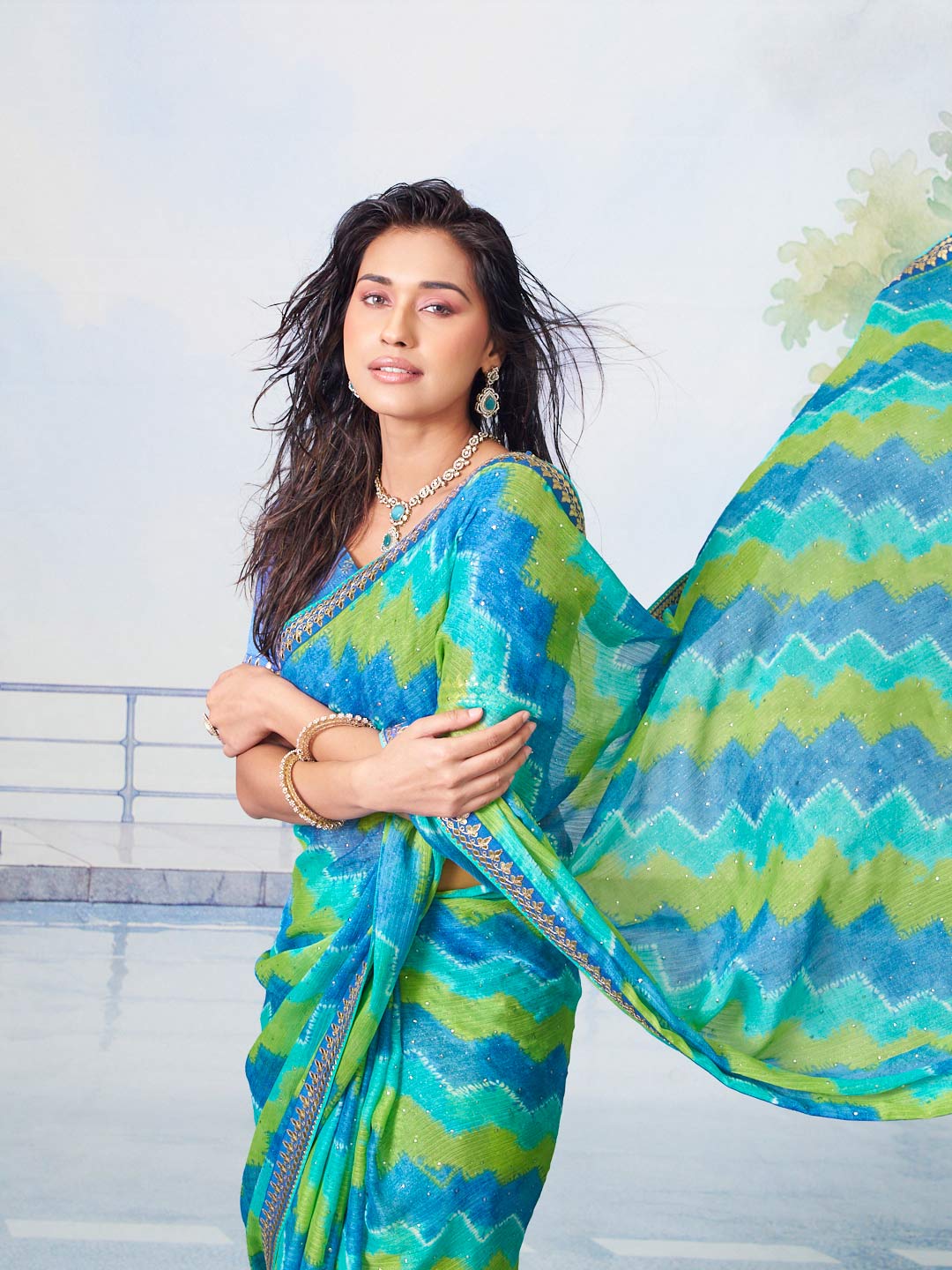 Blue sequined chiffon saree occasion wear